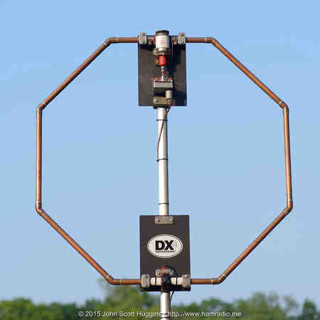 HF small loop antenna with copper octagon, high voltage capacitors and tuning motor.