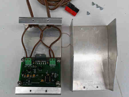 Circuit board inside motor controller case.