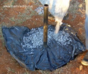KJ4FAJ pours finishing gravel.