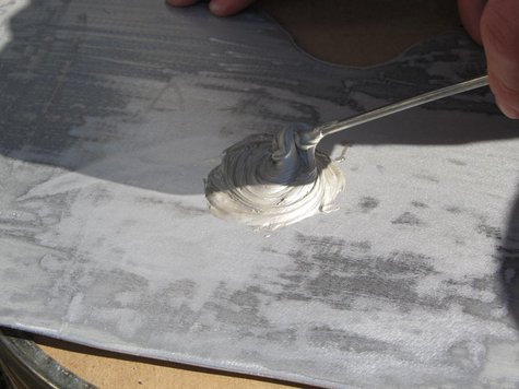 Mix and spread Silver Epoxy over the plate.