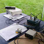 Field Day operating position featuring an Icom IC-2AT and AEA PK-88 for NTS messages.