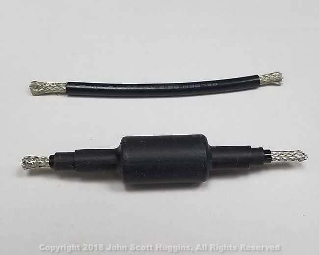 RG-58 coax with and without the choke delivered with N9TAX's Slim Jim antennas.