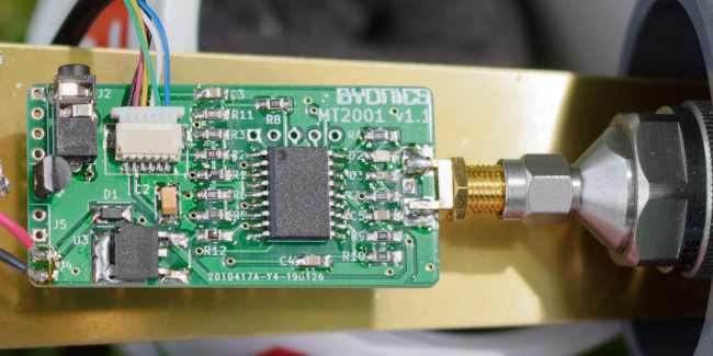 Byonics APRS transmitter, SMA to N adapter all above the brass extension.