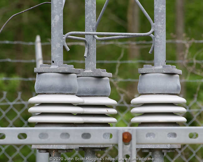 Insulated tower supports for low frequency MSQ Culpeper beacon.