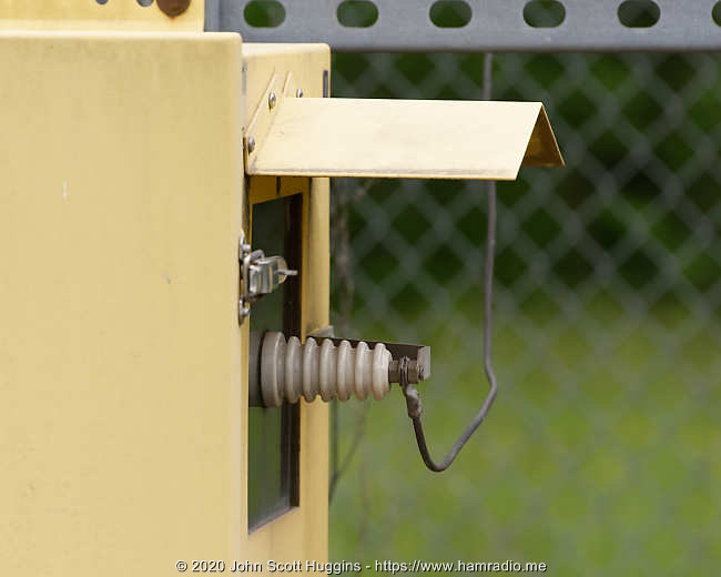 Transmitter with its high voltage terminal supply energy to the insulated tower.